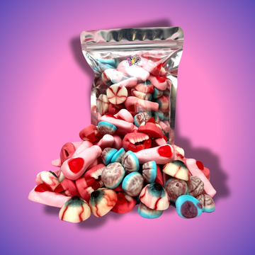 Creepy mix gumicukor, amely tartalmazza a jelly fingers-t, véres szemet, drakula fogat, töltött agyat és óriás koponyát, rémisztő és szórakoztató formákban, élénk színekben.